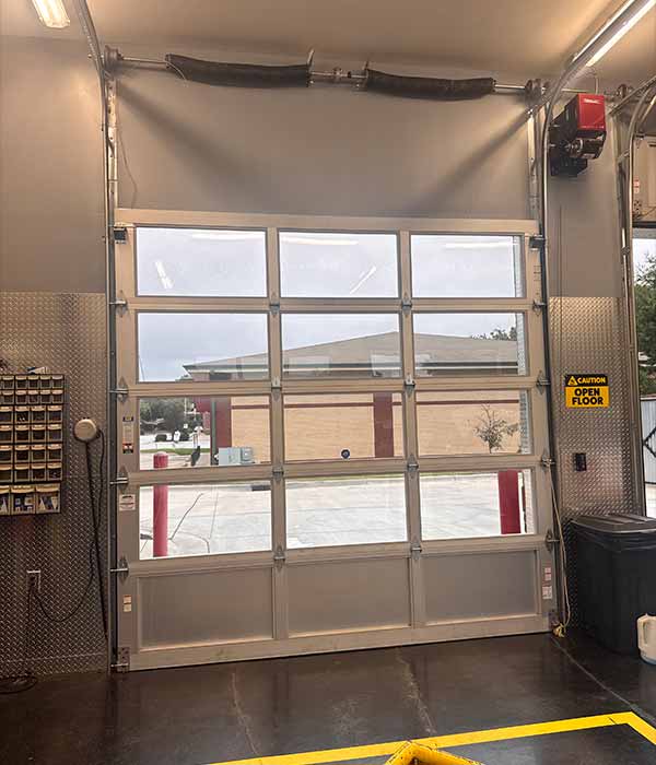 loading dock and overhead garage doors of warehouse